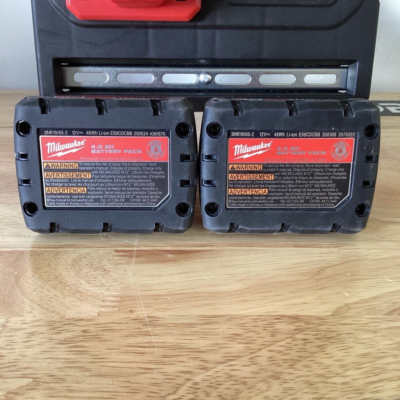 Milwaukee M12 XC4.0 Extended Capacity Battery 2-Pack PACKOUT w/ Wall Plate& Rack